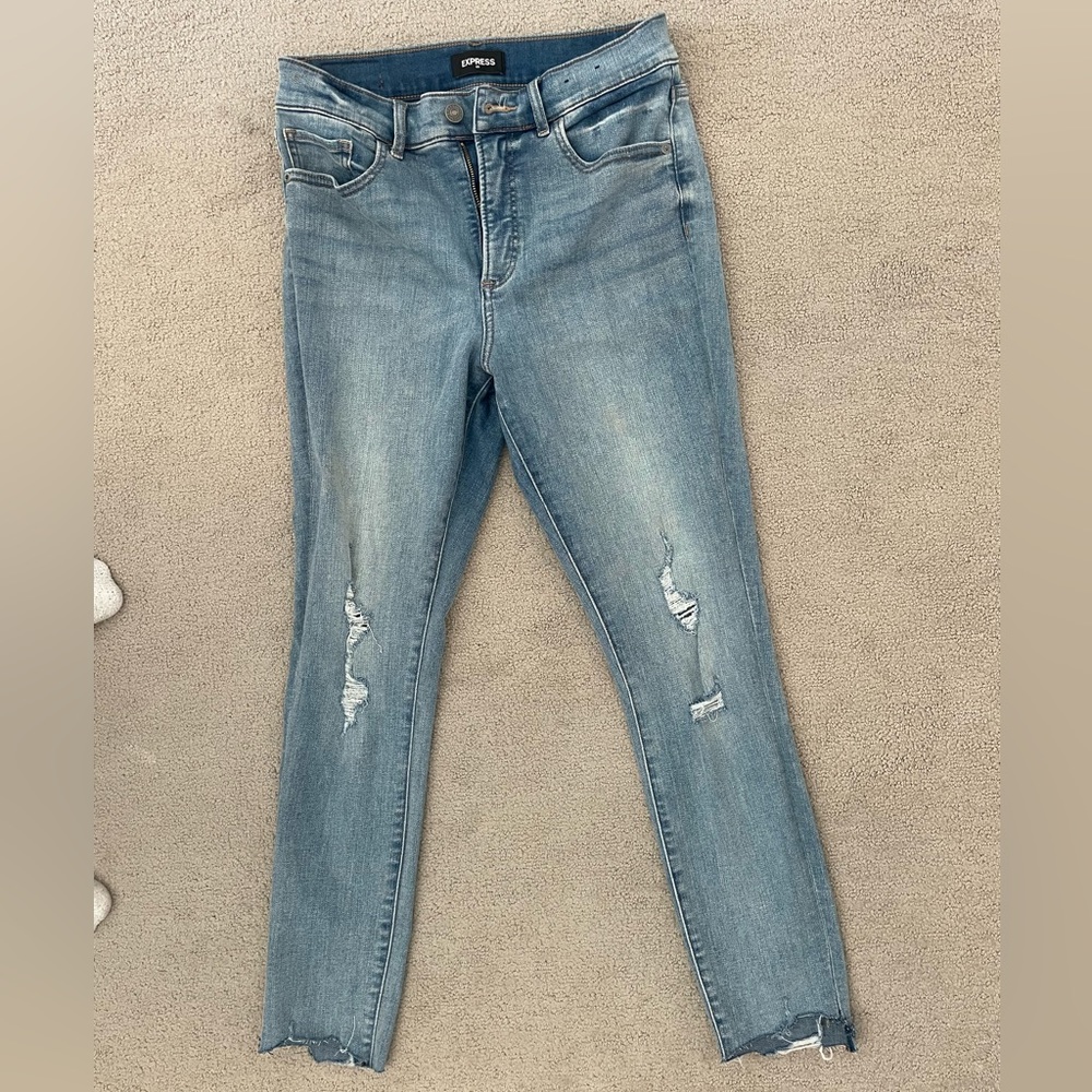 Express medium wash high rise skinny jeans